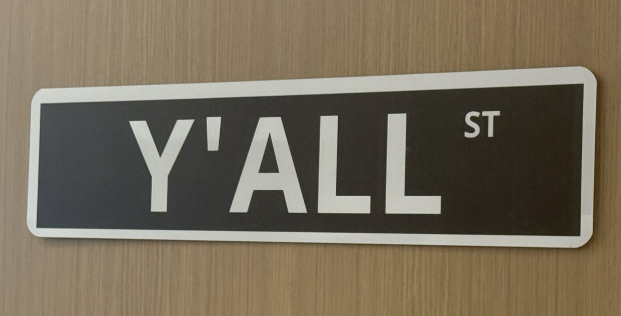 Y'all Street sign at the Texas Stock Exchange event.